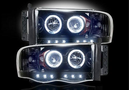 Recon Black Headlights with LED Halo & Daytime 02-05 Dodge Ram - Click Image to Close